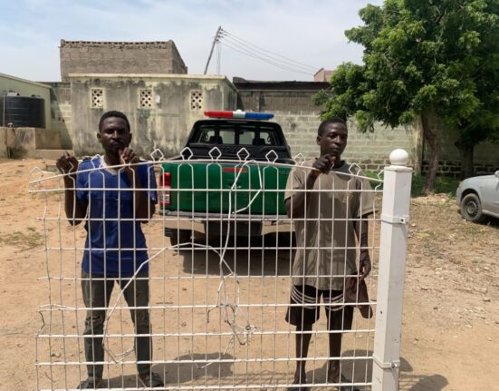 Kano Security Corps arrests two suspects over alleged bridge fence vandalism.