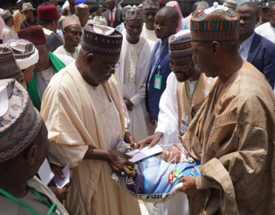 Governor Zulum Distributing the Palliative under the Renewed Hope Sallah Initiative